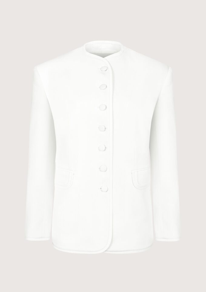 white buttoned up blazer